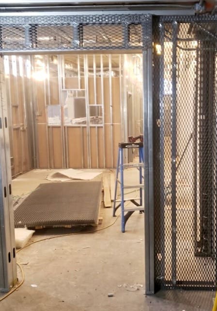 Cannabis workroom with mesh barrier
